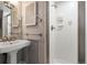 Bathroom with pedestal sink and shower stall at 4535 E Montview Blvd, Denver, CO 80207