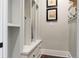 Mudroom with built-in storage cubbies and hooks for organization at 4535 E Montview Blvd, Denver, CO 80207