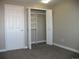 Bedroom featuring a spacious closet with built-in shelving for optimal storage and organization at 2179 Sunridge Cir, Broomfield, CO 80020