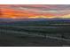 Beautiful scenic view of mountains during an orange and pink sunset at 2179 Sunridge Cir, Broomfield, CO 80020