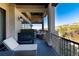 Inviting balcony with comfortable lounge seating, stylish railing, and scenic views at 7952 Dante Dr, Littleton, CO 80125
