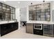 Modern bar area features stainless steel appliances, a wine fridge and contemporary light fixtures at 7952 Dante Dr, Littleton, CO 80125
