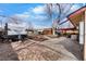 Spacious backyard with fire pit and rv parking at 4713 Cody St, Wheat Ridge, CO 80033