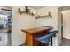 Cozy bar area with bar-height seating for two at 4713 Cody St, Wheat Ridge, CO 80033