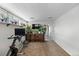 Basement room featuring carpet flooring and a wall of windows at 4713 Cody St, Wheat Ridge, CO 80033