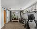 Carpeted basement featuring exercise equipment and a row of windows at 4713 Cody St, Wheat Ridge, CO 80033