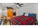 Bedroom featuring a ceiling fan and a plaid comforter at 4713 Cody St, Wheat Ridge, CO 80033