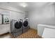 Laundry room with side by side washer and dryer at 4713 Cody St, Wheat Ridge, CO 80033