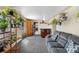 Inviting living room with cozy seating, and stylish bar area at 4713 Cody St, Wheat Ridge, CO 80033