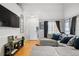 Bright living room with hardwood floors, comfortable seating, and stylish decor, creating a cozy and inviting space at 19707 E 59Th Pl, Aurora, CO 80019