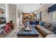 Spacious living area connects seamlessly to the kitchen, providing an open and airy feel at 19707 E 59Th Pl, Aurora, CO 80019