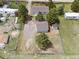 Aerial view of home showing driveway, one car garage, storage shed and fenced yard at 762 S Paddock St, Elizabeth, CO 80107