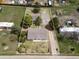 Aerial view of home showing boundaries, driveway, one car garage, and shed at 762 S Paddock St, Elizabeth, CO 80107