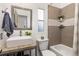Updated bathroom with stylish vanity and modern fixtures at 762 S Paddock St, Elizabeth, CO 80107