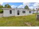 Well-kept single-story home with green lawn, offering a welcoming curb appeal at 762 S Paddock St, Elizabeth, CO 80107