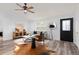 Bright living room with stylish decor and lots of natural light at 762 S Paddock St, Elizabeth, CO 80107