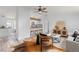 Open-concept living room offering lots of natural light, hardwood floors and an elegant decor at 762 S Paddock St, Elizabeth, CO 80107