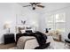 Beautifully decorated main bedroom with ceiling fan and ample natural light at 762 S Paddock St, Elizabeth, CO 80107
