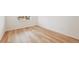 Bright bedroom with natural light, neutral paint, and wood flooring, providing a comfortable and versatile space at 190 Lark Sparrow Way, Bennett, CO 80102