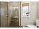 Modern bathroom features sleek shower, vessel sink, and window for natural light at 2255 18Th St, Boulder, CO 80302