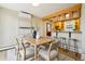 Open concept dining room adjacent to kitchen featuring modern decor and natural light at 2255 18Th St, Boulder, CO 80302