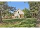 Charming home with a well-manicured lawn and a vibrant red front door at 2255 18Th St, Boulder, CO 80302