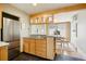Bright kitchen features stainless steel appliances, granite countertops, and seamless access to the dining area at 2255 18Th St, Boulder, CO 80302