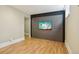 Inviting living room features sleek mounted TV with stylish wood floors and modern aesthetics at 2255 18Th St, Boulder, CO 80302