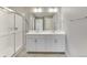 Bathroom boasts double vanity and shower at 18344 Prince Hill Cir, Parker, CO 80134