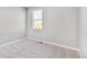 Simple bedroom with carpeted floors and a window at 18344 Prince Hill Cir, Parker, CO 80134