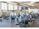 Fully equipped gym featuring modern exercise machines, weights, and ample workout space at 6153 N Ceylon St # 104, Denver, CO 80249