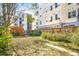 View of backyard, fenced in and overgrown with plants at 2914 W 29Th Ave, Denver, CO 80211