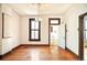 This dining room features wood flooring and a vintage ceiling light fixture at 2914 W 29Th Ave, Denver, CO 80211