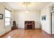 Bright living room features hardwood floors, detailed trim, and large window at 2914 W 29Th Ave, Denver, CO 80211