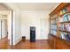 Interior view of a room with a large bookshelf, hardwood floors, and period moldings at 2914 W 29Th Ave, Denver, CO 80211