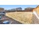 Fenced backyard with space for entertaining, landscaping, and enjoying time outdoors at 13673 Valentia St, Thornton, CO 80602