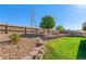 Landscaped backyard featuring a tiered retaining wall at 11082 Callaway Rd, Parker, CO 80138