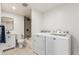Basement bathroom with shower/tub and laundry hookups at 11082 Callaway Rd, Parker, CO 80138