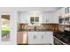 Updated kitchen with granite countertops and stainless steel dishwasher at 11082 Callaway Rd, Parker, CO 80138
