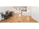 Spacious living room featuring hardwood floors and ample natural light at 11082 Callaway Rd, Parker, CO 80138