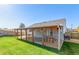 Covered patio with wood pergola and spacious concrete area at 11082 Callaway Rd, Parker, CO 80138