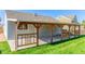 Spacious covered patio with pergola in the backyard at 11082 Callaway Rd, Parker, CO 80138