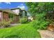 Well-maintained backyard with brick accents, perfect for relaxation and entertaining at 1321 Ruby Way, Longmont, CO 80504