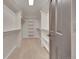 Well-organized walk-in closet with ample shelving and hanging space at 1321 Ruby Way, Longmont, CO 80504