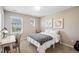 Bedroom featuring large windows and neutral walls at 9446 E 51St Dr, Denver, CO 80238