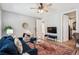 Cozy living room with great natural light and hardwood floors at 9446 E 51St Dr, Denver, CO 80238