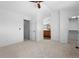 Large primary bedroom boasting neutral walls and access to the ensuite bathroom and closet at 14247 Pikeminnow Pl, Broomfield, CO 80023