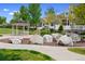 Community park featuring a gazebo, walking paths, and lush landscaping at 14247 Pikeminnow Pl, Broomfield, CO 80023