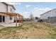 Spacious backyard with a pergola, a grassy area, and a privacy fence at 4280 Pioneer Pl, Brighton, CO 80601