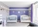 Bright Bedroom with two white cribs, gray and purple accents, and adorable elephant decor at 4280 Pioneer Pl, Brighton, CO 80601